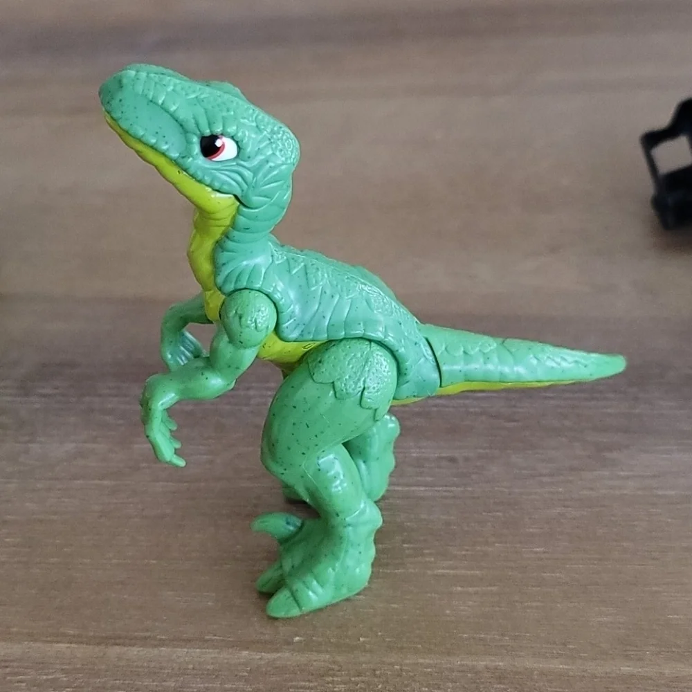 Fisher-Price Imaginext Raptor Doc & Exo Suit Dinosaur Figure Toy Set